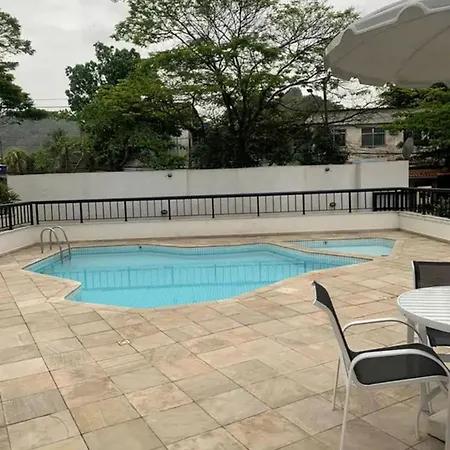 Quarto1 privativo em APTO Rio Centro Barra Olímpica - Com Anfitrião Room with host-3